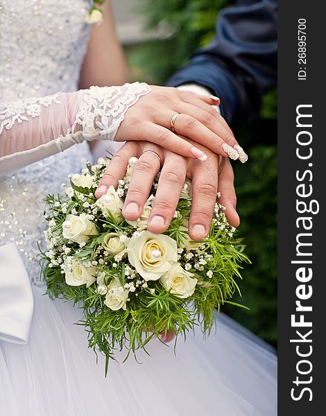 Hands On The Wedding Bouquet