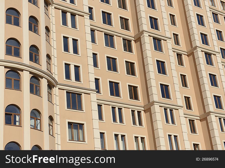 Side view on the generic red brick office building. Side view on the generic red brick office building