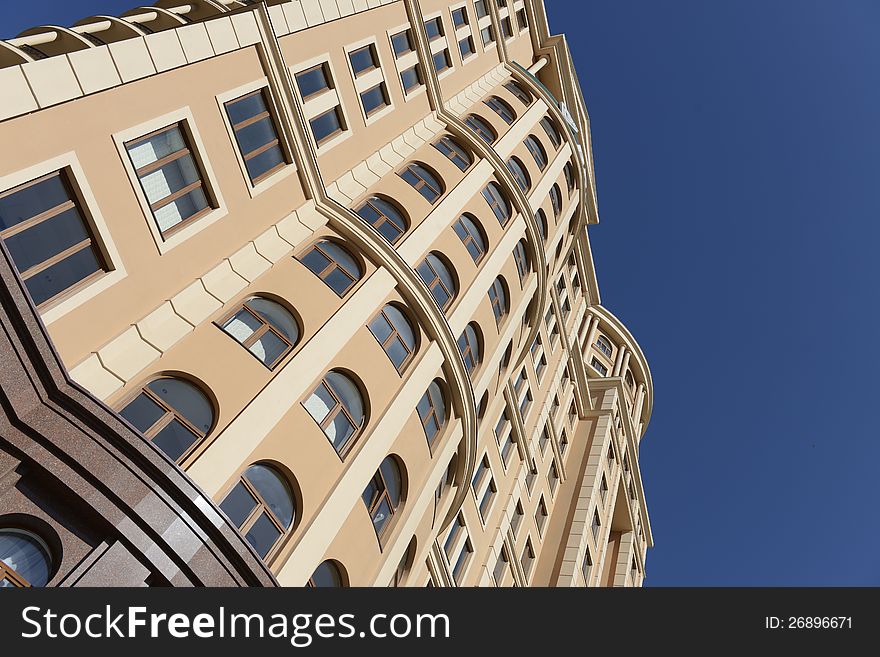 Side view on the generic red brick office building. Side view on the generic red brick office building