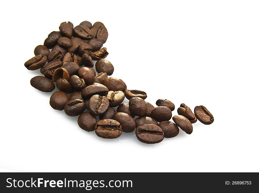 Coffee beans close up on white background