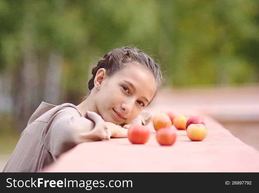 Portrait of Girl with Red Apples