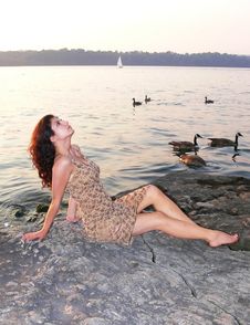 Lady On The Lake In Sunset Royalty Free Stock Photo Lady On The Lake In Sunset Royalty Free Stock Photo