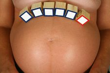 Baby Blocks On Pregnant Belly Stock Photo Baby Blocks On Pregnant Belly Stock Photo
