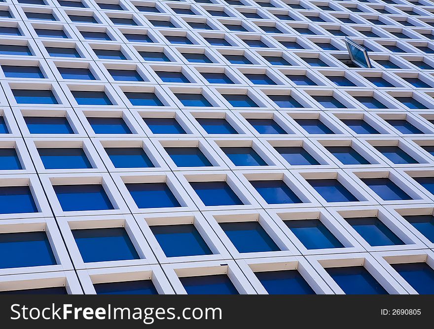 Windows of modern skyscrapers office building. Windows of modern skyscrapers office building