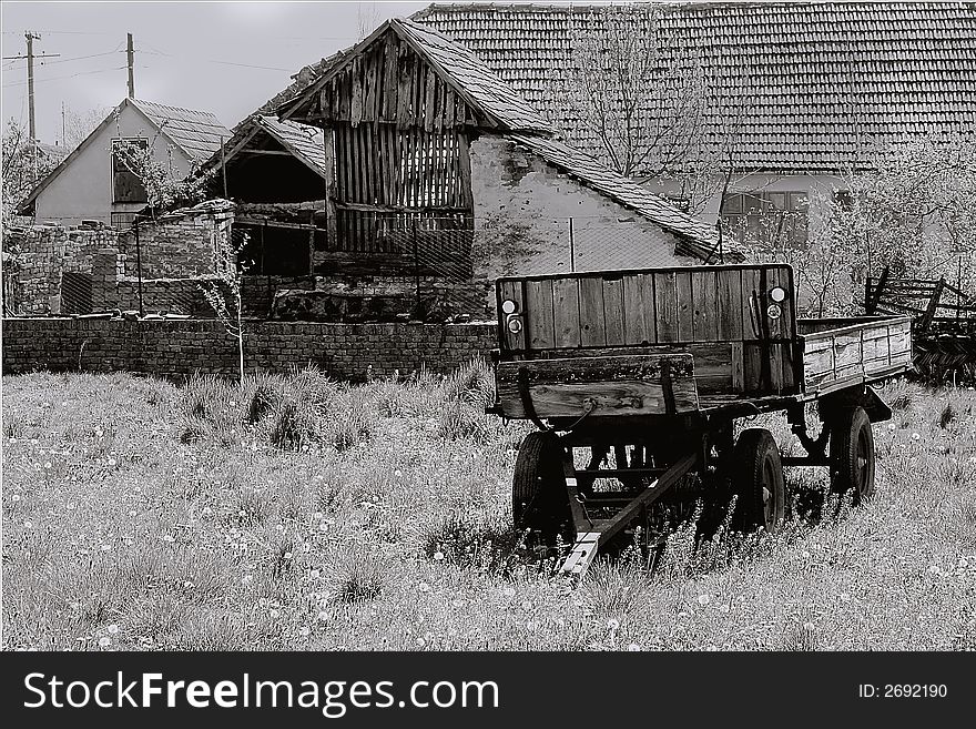 Black and white photo of farm chariot