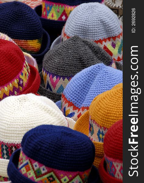 A Close Up of Traditional Peruvian Hats on a Market Stall. A Close Up of Traditional Peruvian Hats on a Market Stall