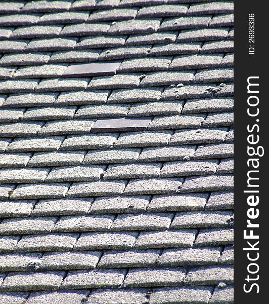 A photo of a roof top tile pattern background. A photo of a roof top tile pattern background.