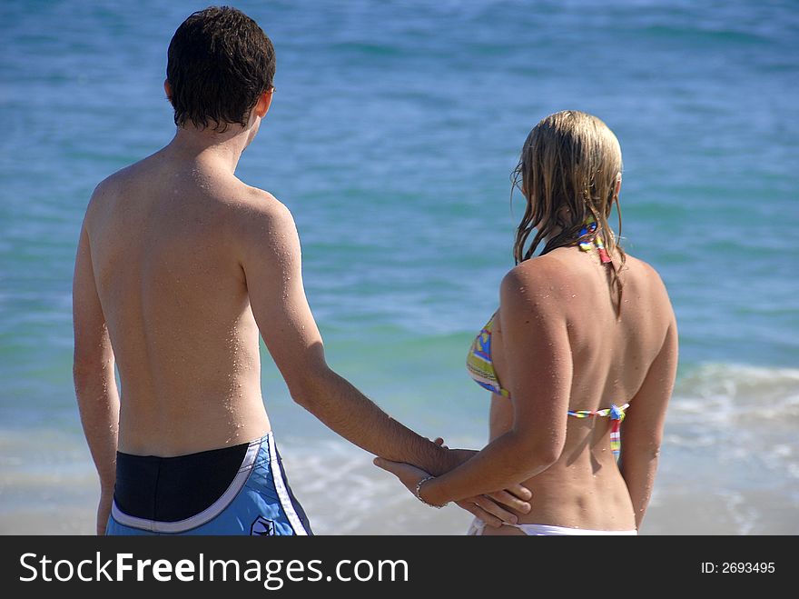 A young couple on the beach. A young couple on the beach