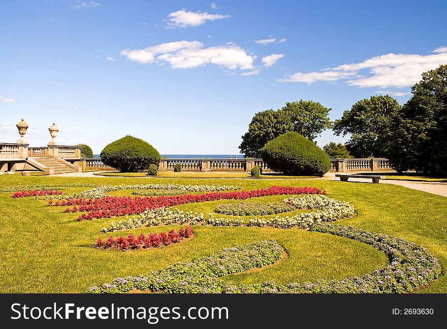 A view across the private gardens of a luxury estate in Newport, Rhode Island. A view across the private gardens of a luxury estate in Newport, Rhode Island.