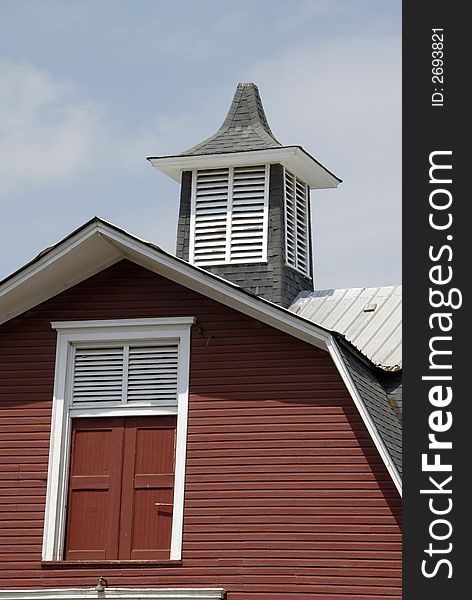 Classic architectural roof lines of an old barn. Classic architectural roof lines of an old barn