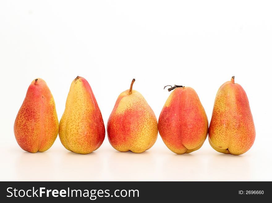 Five juicy pears ready to be eaten. Five juicy pears ready to be eaten