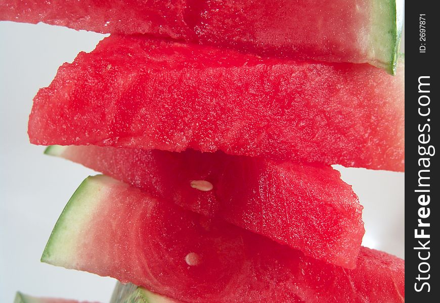 Juicy watermelon pieces stack for summer picnic. Juicy watermelon pieces stack for summer picnic