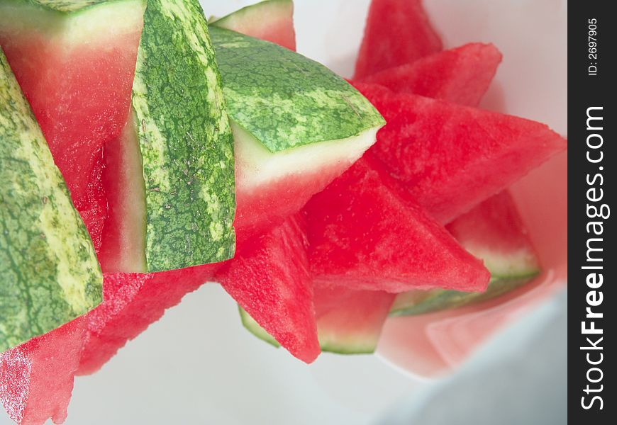 Juicy watermelon pieces stack for summer picnic. Juicy watermelon pieces stack for summer picnic