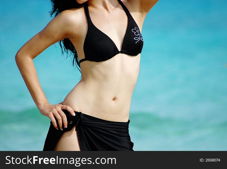 Bikini girl on tropical beach