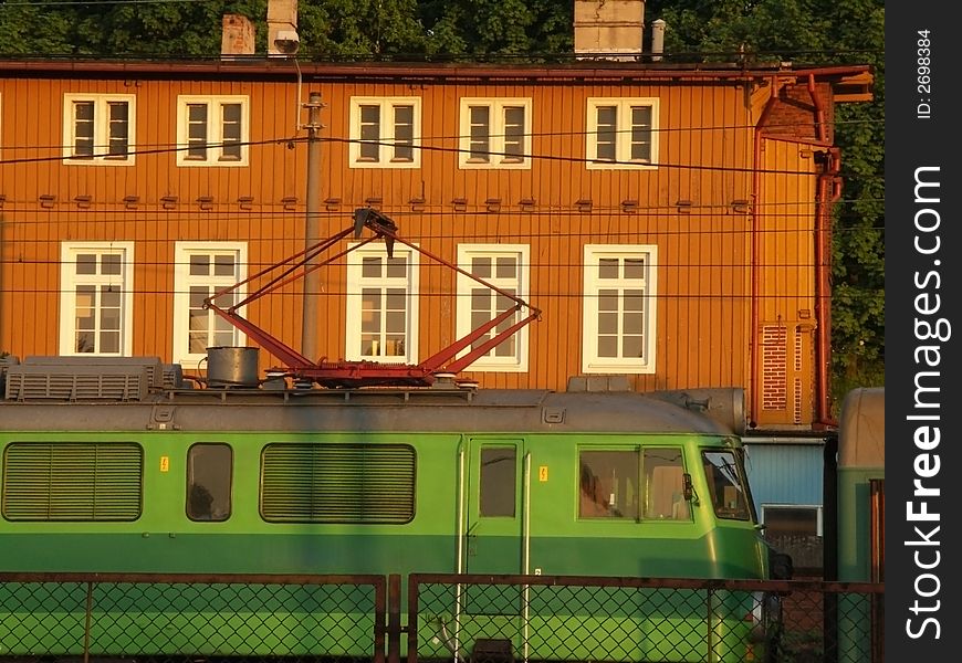 Poland, vintage green train on a station