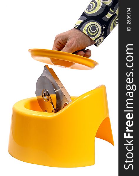 Man close broken hard drive in yellow childs pot. Man close broken hard drive in yellow childs pot