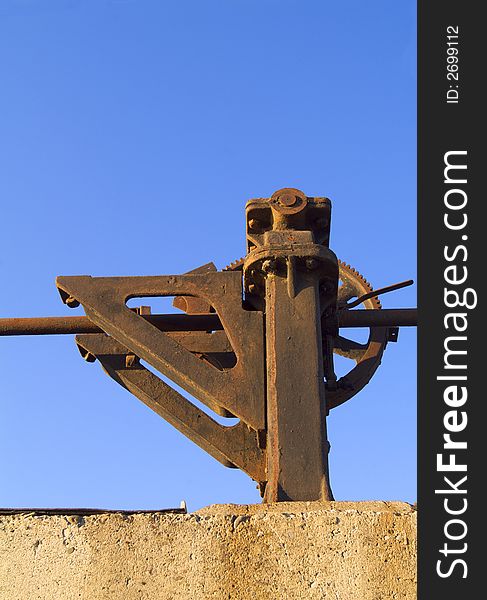 Machinery part of water works, showing rust and age. Machinery part of water works, showing rust and age.