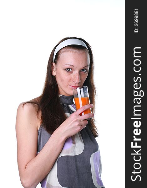 Woman with carrots juice on a white background