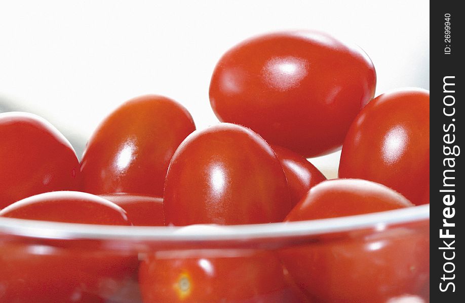 Close-up of cherry tomatoes in a glass bowl