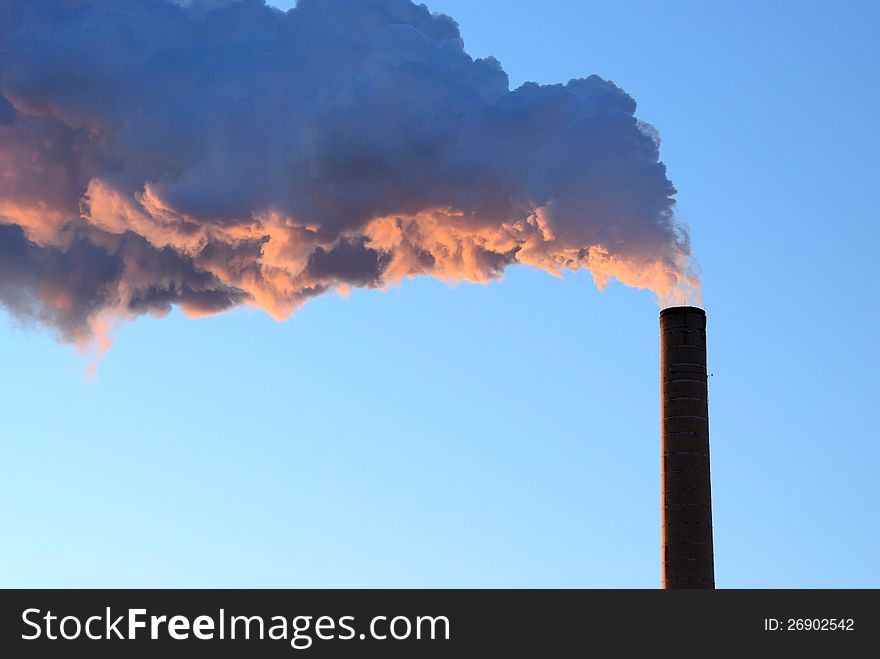 Smoke Stack In Early Winter Morning