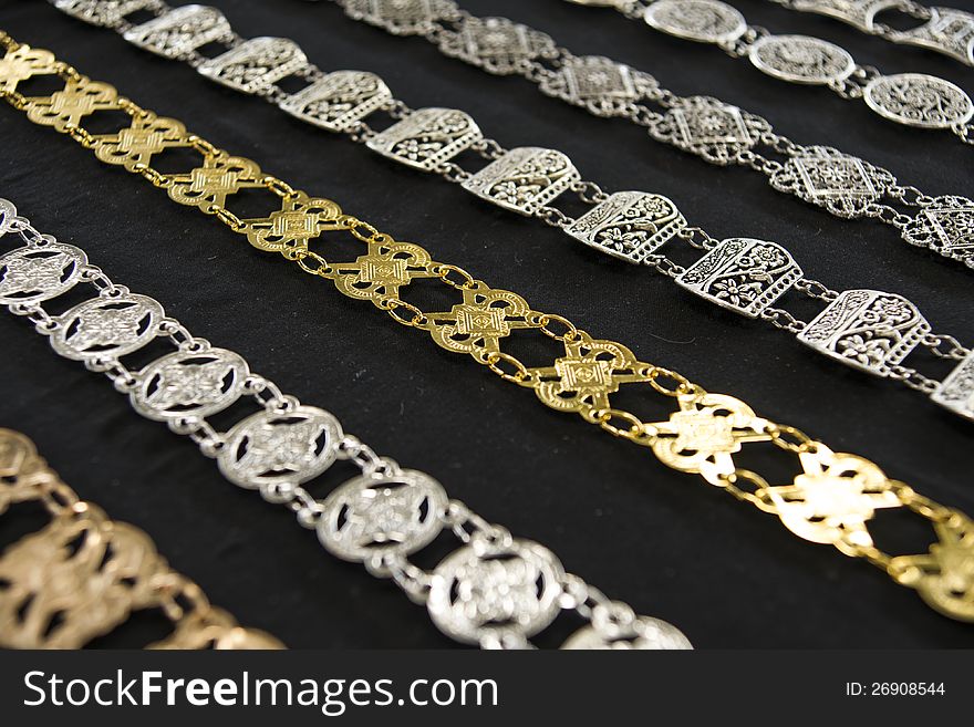 Necklaces, belts, jewelry made ​​of silver.