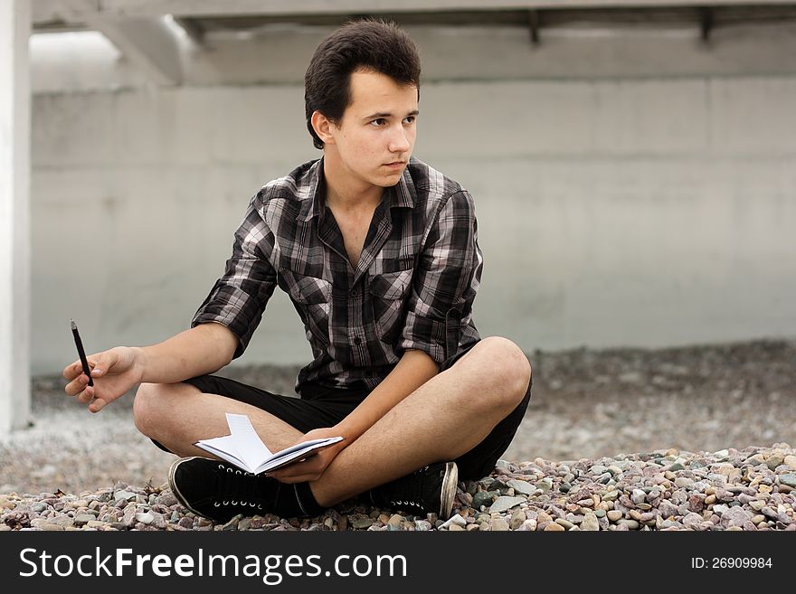 Boy With Notebook
