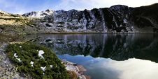 Alpine Lake Reflection - Retezat Mountains Stock Photo Alpine Lake Reflection - Retezat Mountains Stock Photo