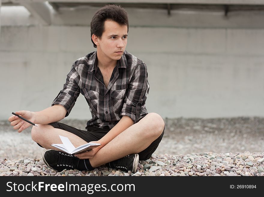 Boy With Notebook