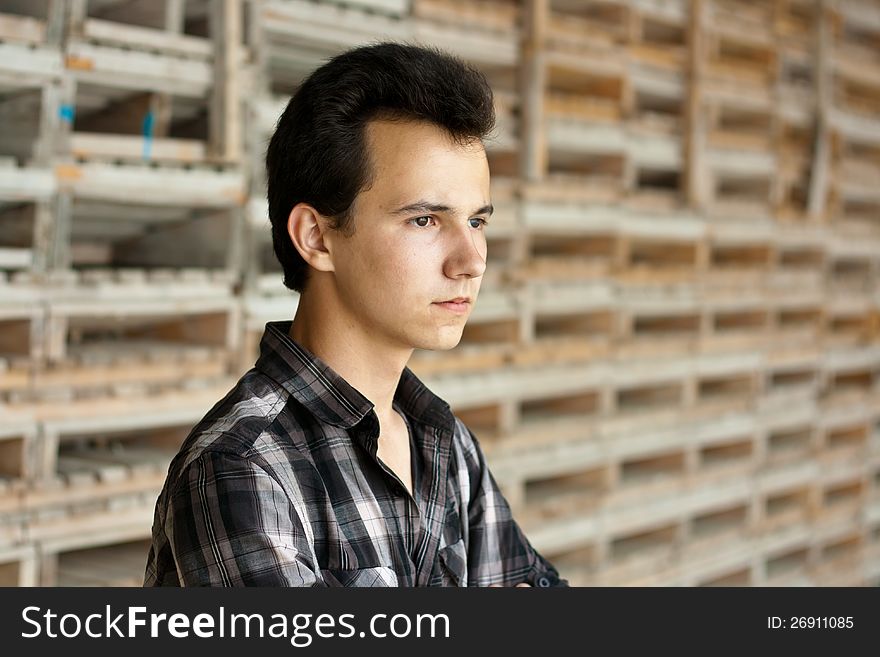 Young man stay near the boards