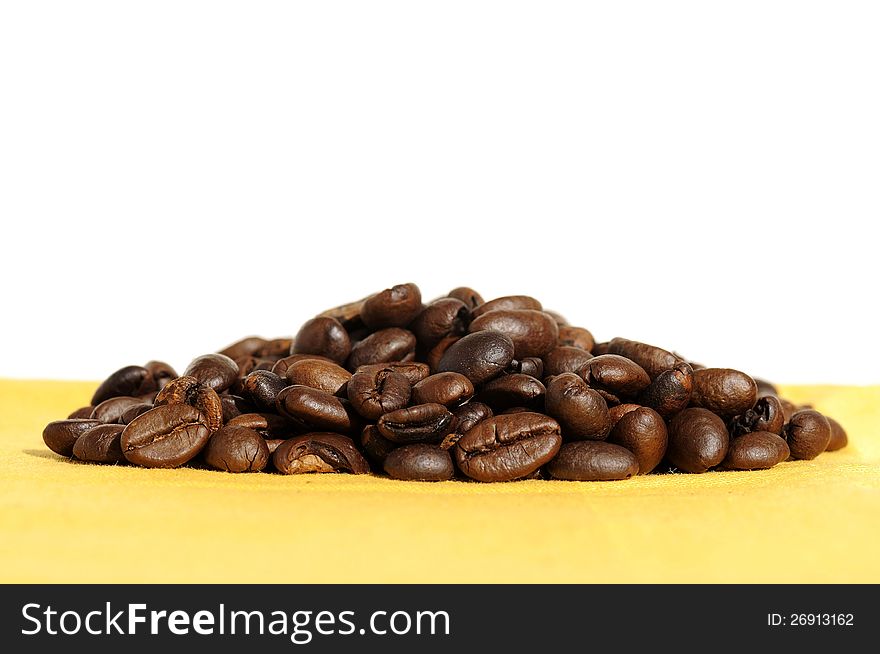 Roasted coffee bean shot on white background