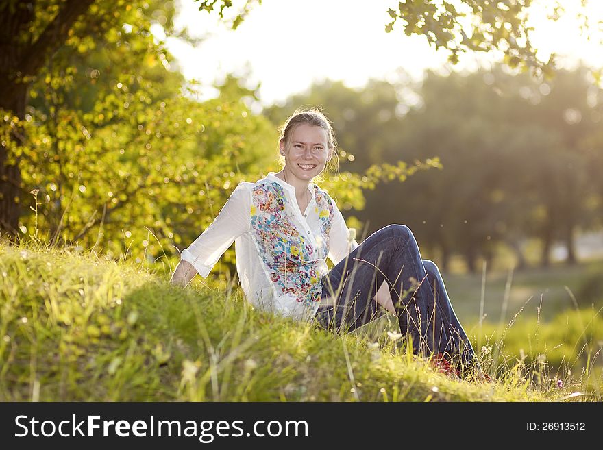 Portrait of beautiful blond woman outdoors