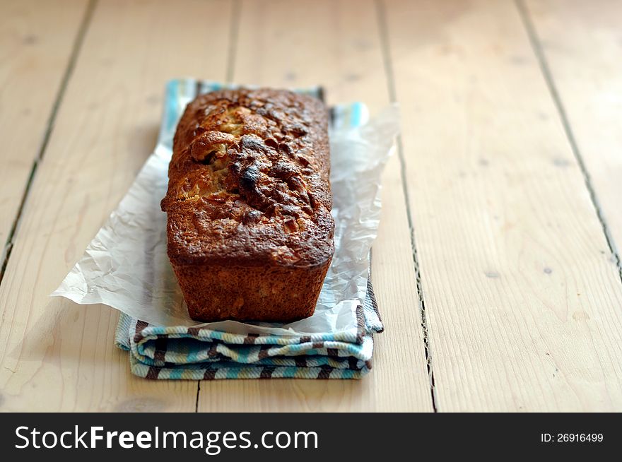 An Apple Cake On A Striped Towel