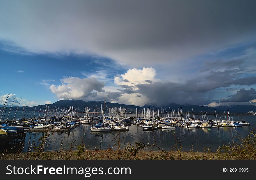 Boats resting under beautiful cloudy sky at Vancouver Canada