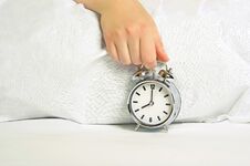 Woman Holding The Alarm Clock Royalty Free Stock Photos Woman Holding The Alarm Clock Royalty Free Stock Photos
