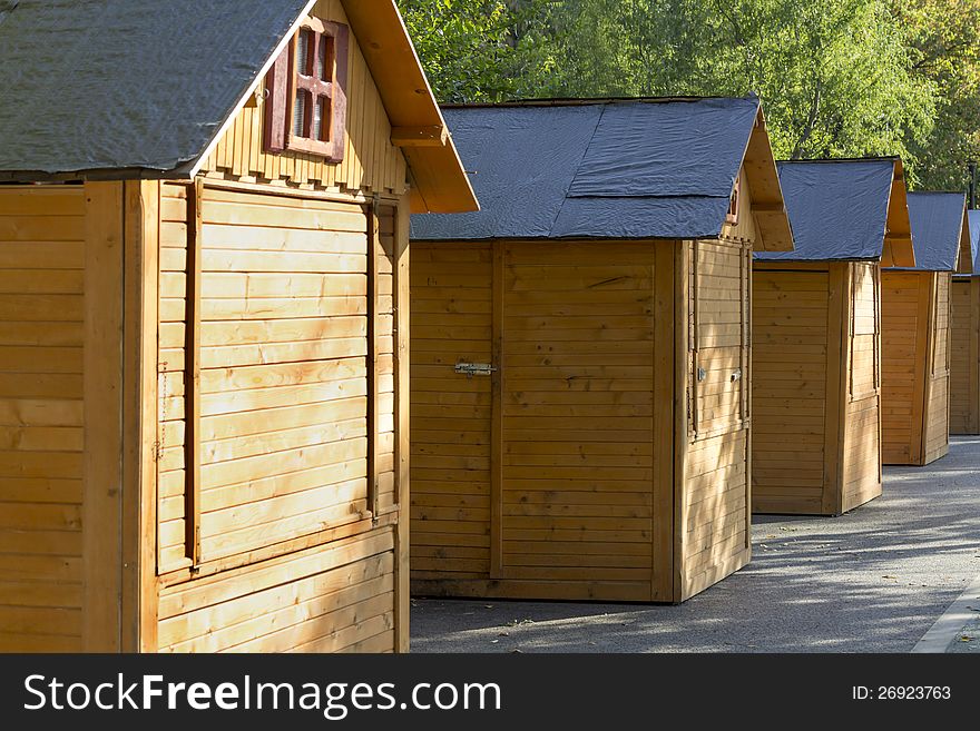 A closed fair, with small houses made from wood. A closed fair, with small houses made from wood