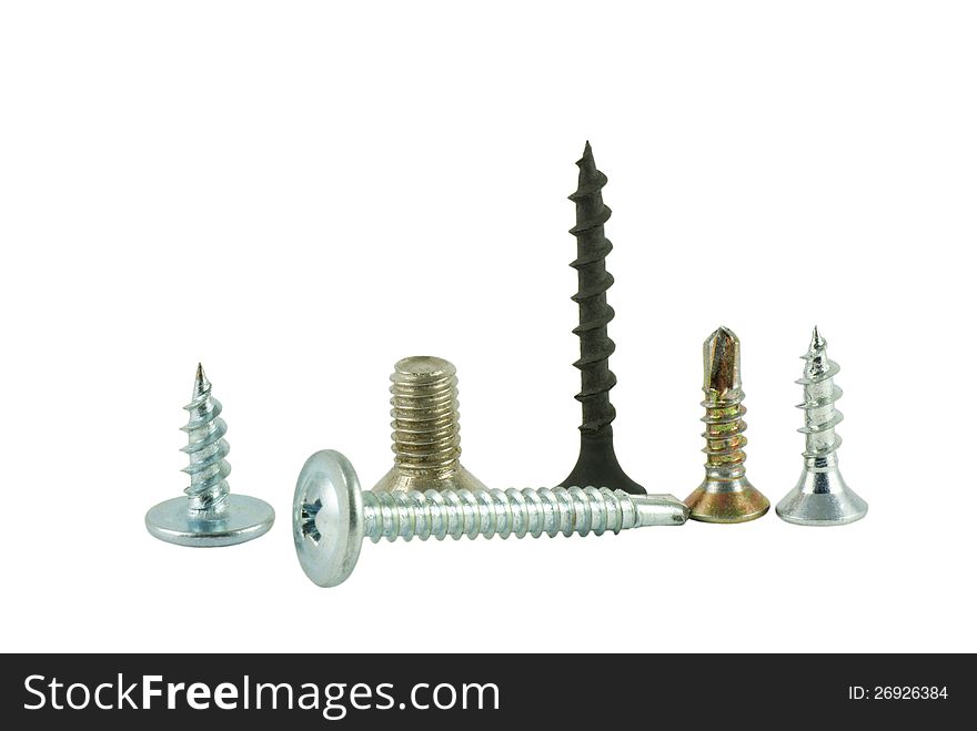 Group of different screws on a white background