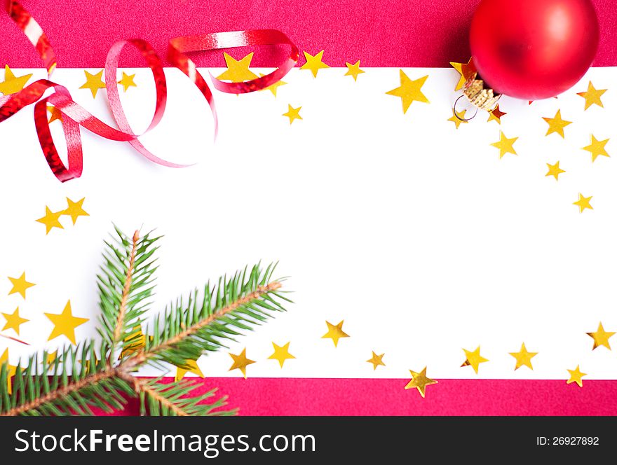 Christmas Card with pine and Christmas ornaments.