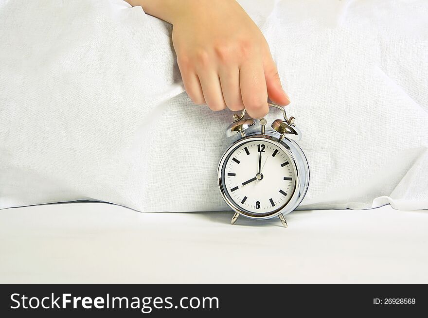 Woman Holding The Alarm Clock