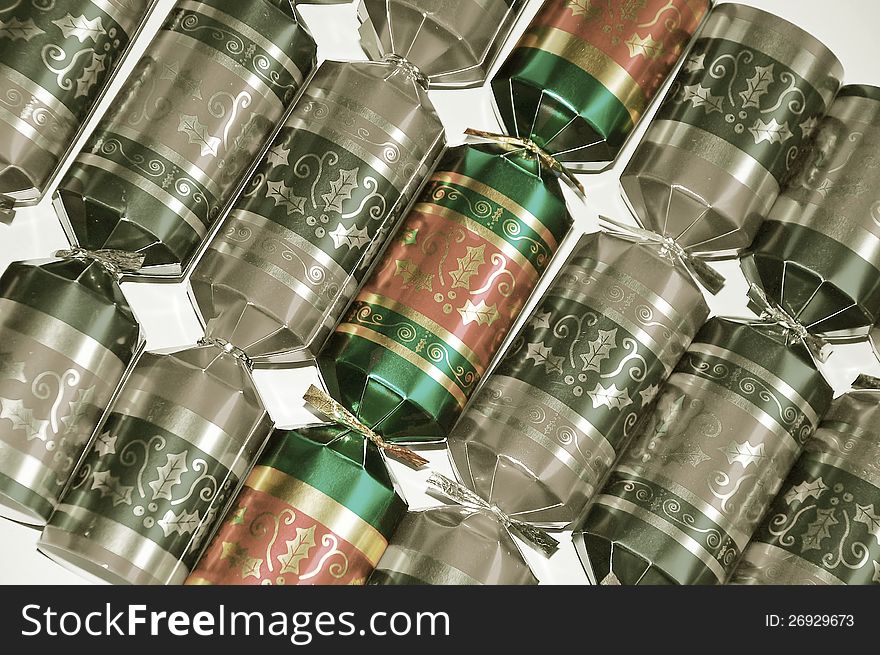 Glittery red and green christmas crackers. Glittery red and green christmas crackers