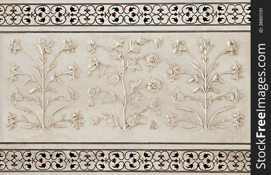 Detail of inlay and carvings decorating the Taj Mahal, Agra, India. Detail of inlay and carvings decorating the Taj Mahal, Agra, India