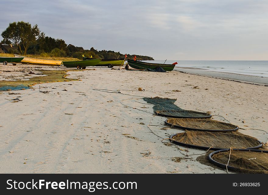 Boats of fishermen at early morning in the gulf of Riga, Baltic Sea, Latvia, Europe. Boats of fishermen at early morning in the gulf of Riga, Baltic Sea, Latvia, Europe