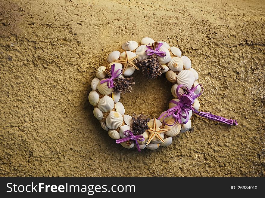 A wreath of lavender, seashells and starfish. A wreath of lavender, seashells and starfish