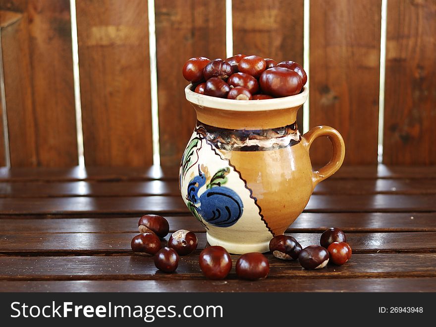 Chestnuts on a traditional pot. Chestnuts on a traditional pot
