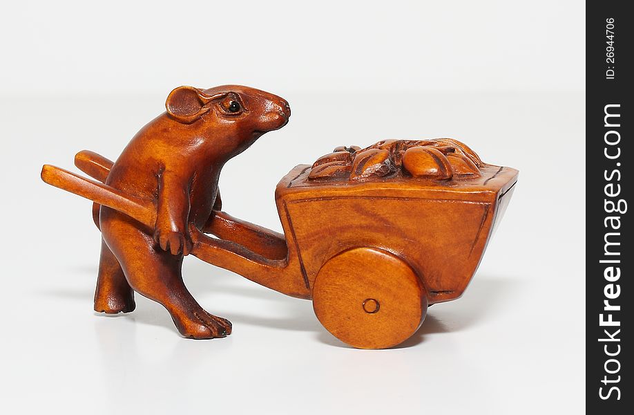 Sculpture mouse pushing a cart