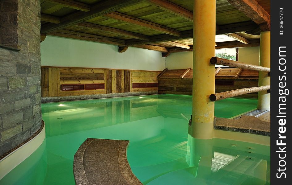 Indoor swimming pool and spa. Luxury accomodation in the Italian Alps. Indoor swimming pool and spa. Luxury accomodation in the Italian Alps.