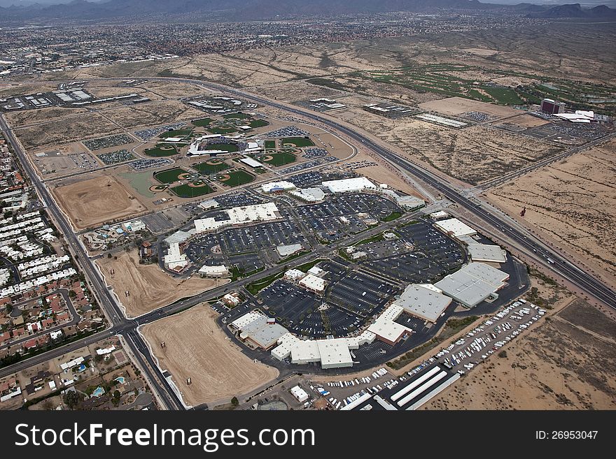 View of a shopping center next to baseball fields and freeway in Scottsdale, Arizona. View of a shopping center next to baseball fields and freeway in Scottsdale, Arizona