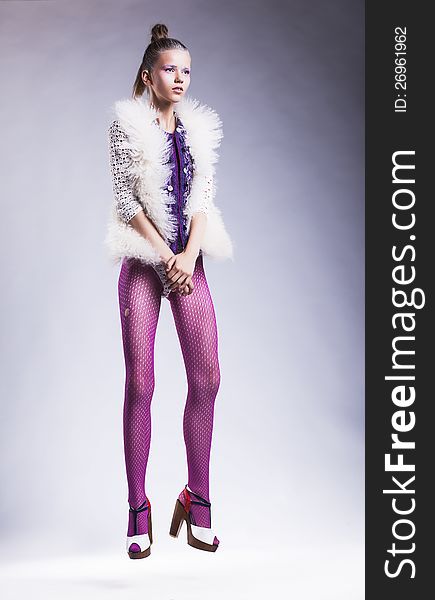 Beauty style - fashion female model posing in pink stockings. Beauty style - fashion female model posing in pink stockings