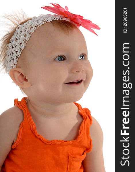 Little Girl with flower on her head isolated on a white background