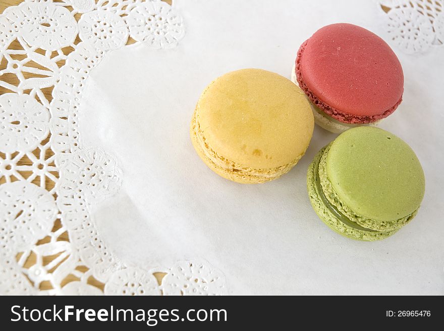 Colorful of french macarons dessert on white background. Colorful of french macarons dessert on white background