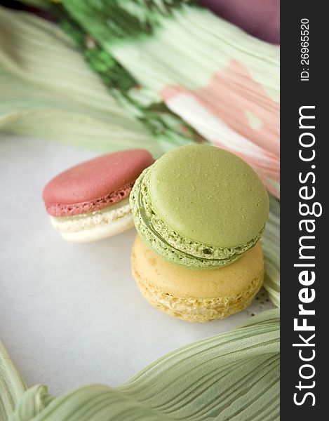Stack of sweet macarons with soft texture background